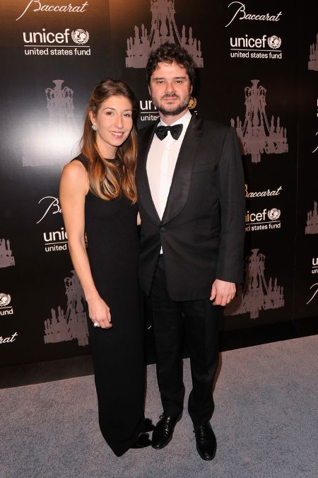 Both are in a black dress.